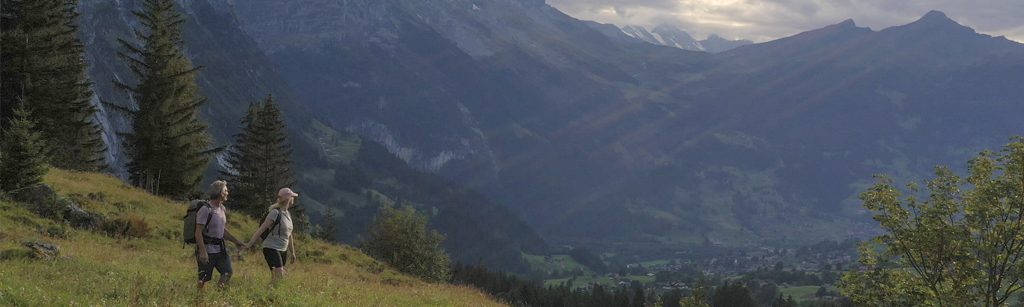 Hiking in the mountains with your partner